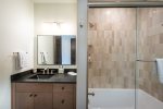 The ensuite bathroom for bedroom 3 offers a bathtub/shower combination.